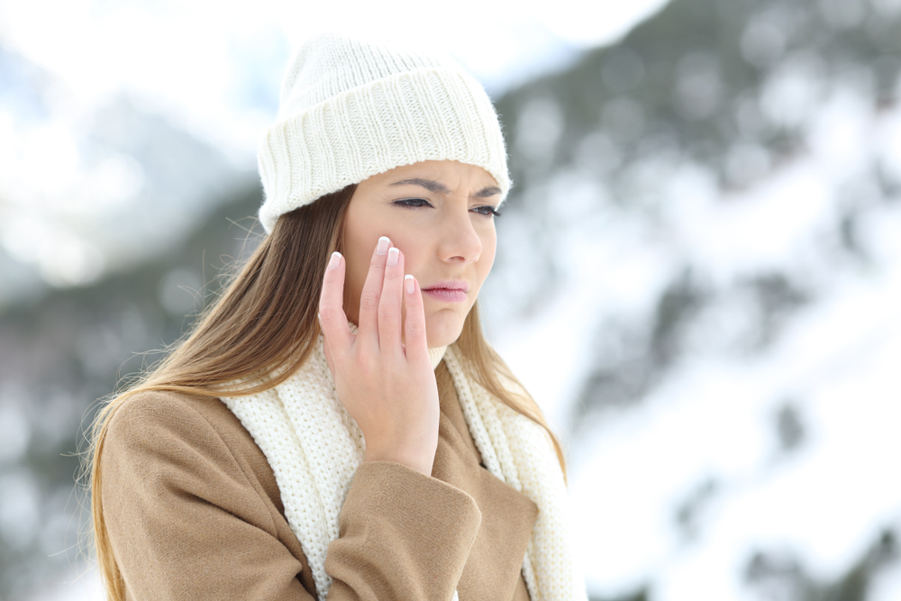 Angry,Woman,Using,A,Sking,Protection,Moisturizer,Cream,In,Winter